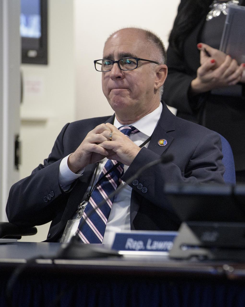 Sam Scimemi, Director of NASA’s International Space Station Division is seen as he watches the beginning of the first all-woman spacewalk on Friday, Oct. 18, 2019, from the Space Operations Center at NASA Headquarters in Washington. The first all-woman spacewalk in history began at 7:38am EDT with NASA astronauts Christina Koch and Jessica Meir venturing outside the International Space Station to replace a failed battery charge-discharge unit. This is the fourth spacewalk for Koch and Meir’s first. Photo Credit: (NASA/Joel Kowsky)