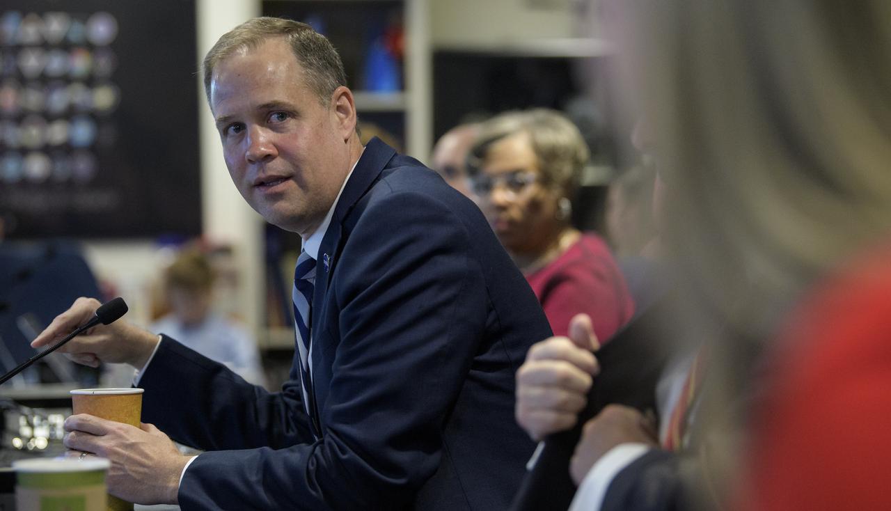 NASA Administrator Jim Bridenstine speaks to members of Congress as they watch the beginning of the first all-woman spacewalk on Friday, Oct. 18, 2019, from the Space Operations Center at NASA Headquarters in Washington. The first all-woman spacewalk in history began at 7:38am EDT with NASA astronauts Christina Koch and Jessica Meir venturing outside the International Space Station to replace a failed battery charge-discharge unit. This is the fourth spacewalk for Koch and Meir’s first. Photo Credit: (NASA/Joel Kowsky)