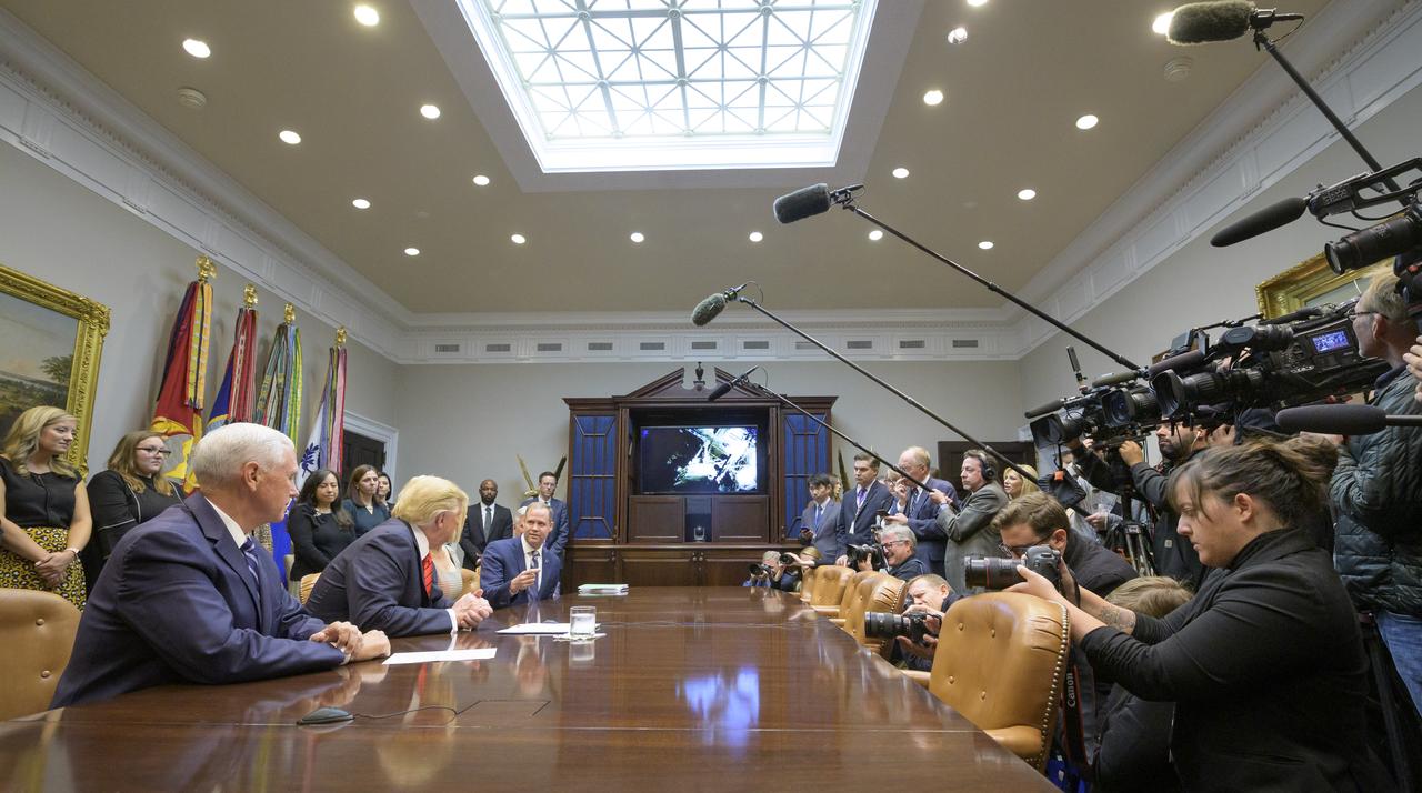 President Donald Trump, 2nd from left, joined by Vice President Mike Pence, left, Advisor to the President Ivanka Trump, listens as NASA Administrator Jim Bridenstine talks about the first all-woman spacewalk, Friday, Oct. 18, 2019, from the Roosevelt Room of the White House in Washington. The first all-woman spacewalk in history began at 7:38am EDT with NASA astronauts Christina Koch and Jessica Meir venturing outside the International Space Station to replace a failed battery charge-discharge unit. This is the fourth spacewalk for Koch and Meir’s first. Photo Credit: (NASA/Bill Ingalls)