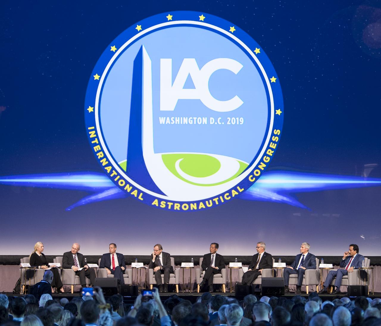 Pascale Ehrenfreund, Incoming President of the International Astronautical Federation (IAF), left, and Jean-Yves Le Gall, President of International Astronautical Federation (IAF), second from left, facilitate a panel with NASA Administrator Jim Bridenstine, Johann-Dietrich Woerner, Director General of ESA (European Space Agency), Hiroshi Yamakawa, President of the Japan Aerospace Exploration Agency (JAXA), Sylvain Laporte, President of the Canadian Space Agency, Sergey Krikalev, Executive Director for Piloted Spaceflights for Roscosmos, and S. Somanath, Director of Vikram Sarabhai Space Centre, Indian Space Research Organization (ISRO), for the Heads of Agency Plenary of the 70th International Astronautical Congress, Monday, Oct. 21, 2019 at the Walter E. Washington Convention Center in Washington. Photo Credit: (NASA/Joel Kowsky)