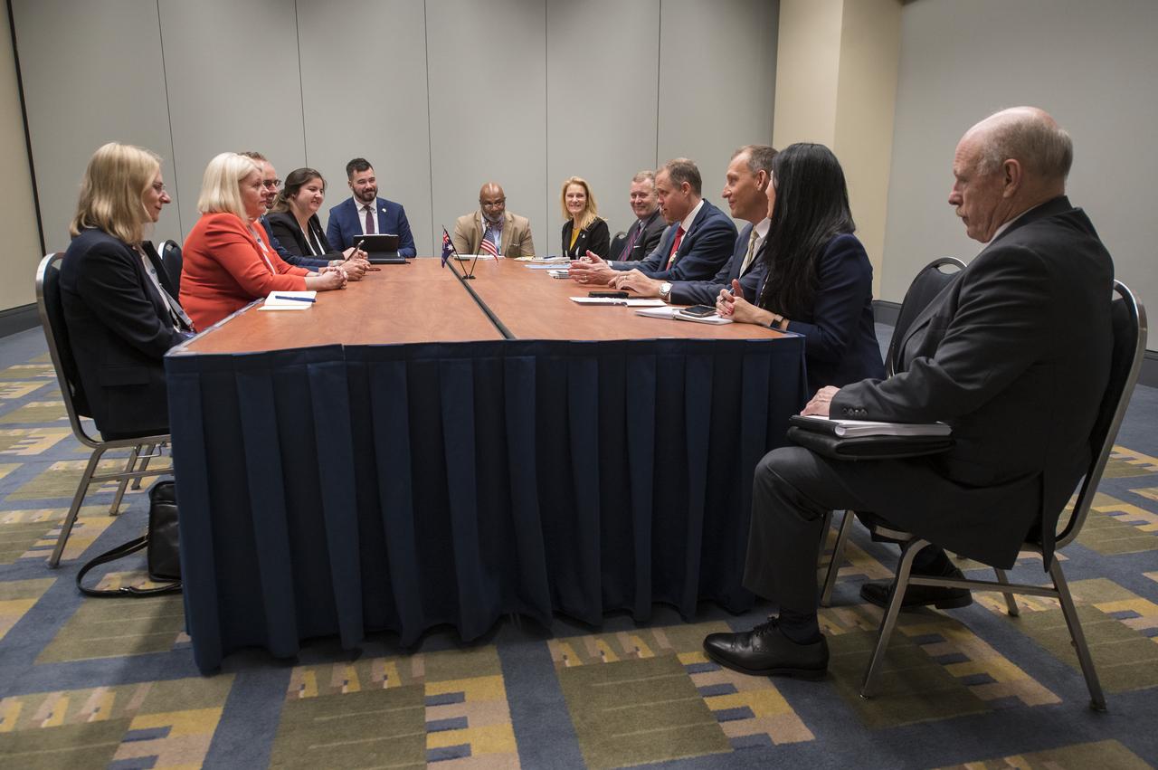 NASA Administrator Jim Bridenstine, fourth from right, and Deputy Administrator Jim Morhard, fifth from right, speak with the Honorable Karen Andrews Minister of Parliament and Minister, Industry, Science and Technology, Austrailia, second from left, during the 70th International Astronautical Congress, Monday, Oct. 21, 2019 in Washington. Photo Credit: (NASA/Aubrey Gemignani)
