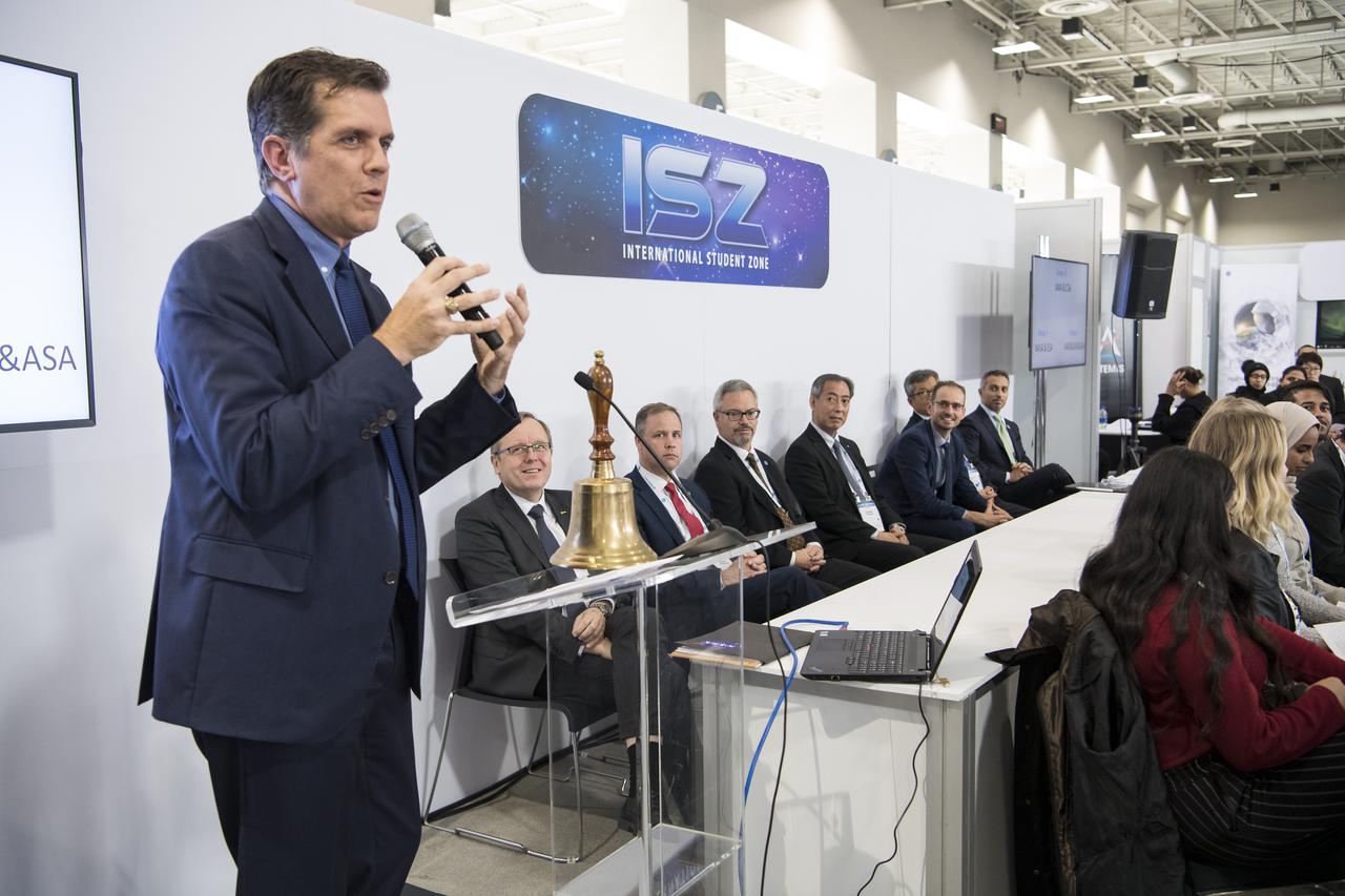 NASA Associate Administrator for STEM Engagement, Mike Kincaid, introduces the heads of agencies that will be participating in an interactive session with students, from left to right, Dr. Johann-Dietrich Worner, director general of the European Space Agency (ESA); NASA Administrator Jim Bridenstine; Sylvain Laporte, president of the Canadian Space Agency (CSA); Dr. Hiroshi Yamakawa, president of the Japan Aerospace Exploration Agency (JAXA); Anthony Murfett, deputy head fo the Australian Space Agency (ASA); Jeong Joo Park, Vice President fo the Korean Aerospace Research Institute (KARI); and H.E. Dr. Ahmad bin Abdulla Humaid Belhoul Al Falasi, Minister of State for Higher Education and Advanced Skills and Chairman of the UAE Space Agency (UAESA), during the 70th International Astronautical Congress, Monday, Oct. 21, 2019 at the Walter E. Washington Convention Center in Washington. Photo credit: (NASA/Aubrey Gemignani)