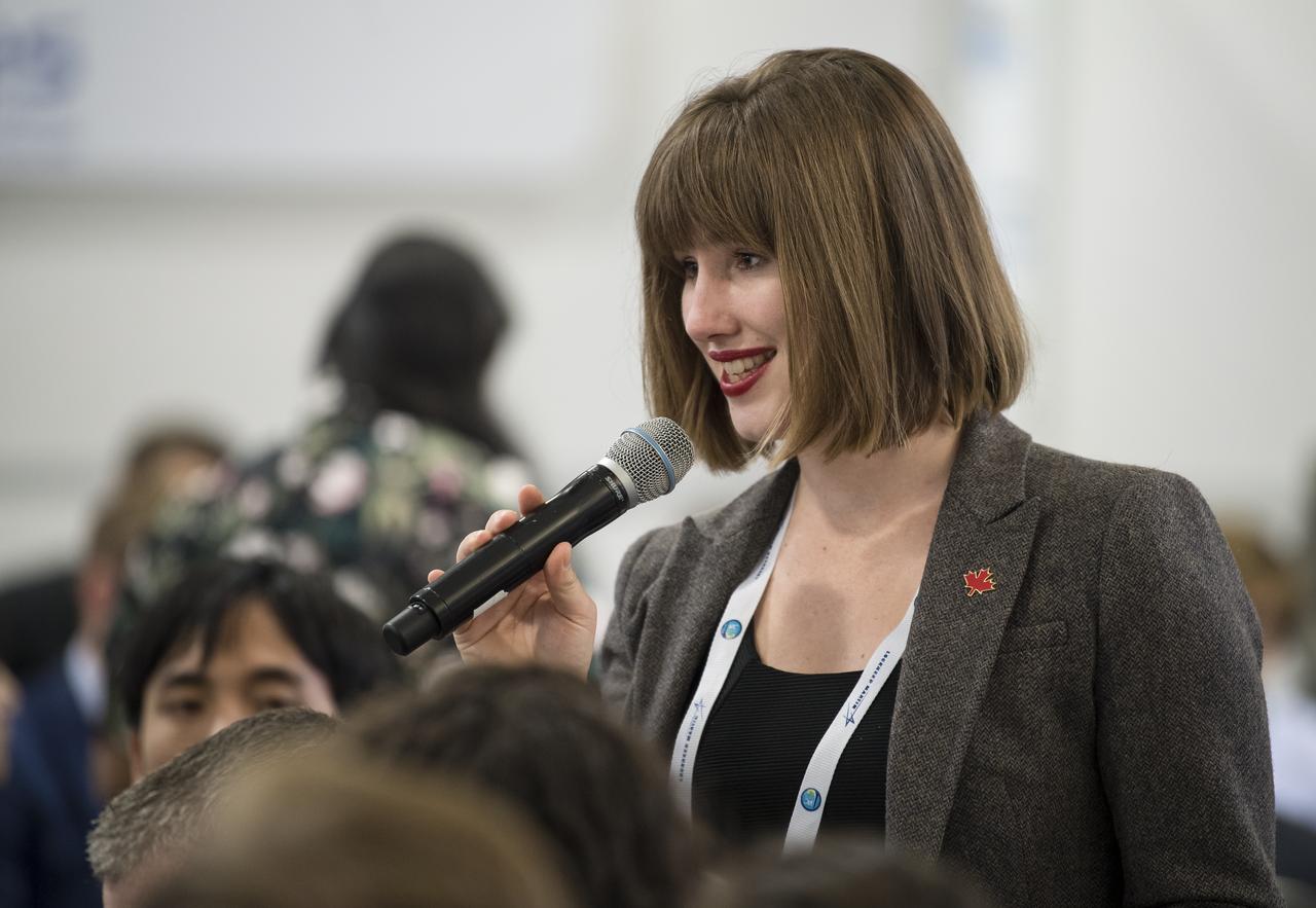 A student asks NASA Administrator Jim Bridenstine a question during a Heads of Agency interactive session at the 70th International Astronautical Congress, Monday, Oct. 21, 2019 at the Walter E. Washington Convention Center in Washington. Photo credit: (NASA/Aubrey Gemignani)