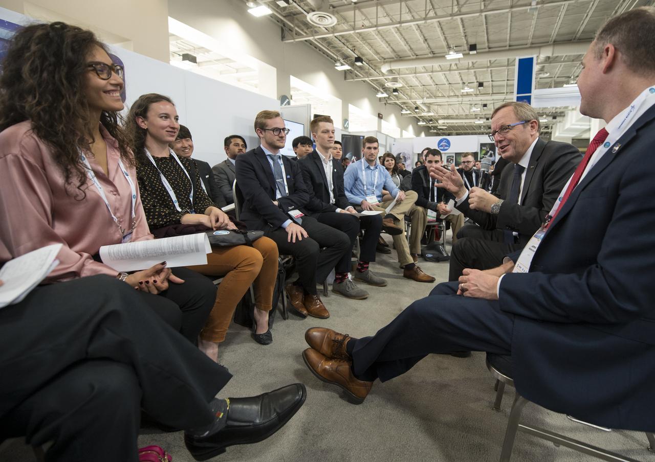 Dr. Johann-Dietrich Worner, Director General, European Space Agency (ESA), second from right, and NASA Administrator Jim Bridenstine, right, answer questions during a Heads of Agency interactive session with students during the 70th International Astronautical Congress, Monday, Oct. 21, 2019 at the Walter E. Washington Convention Center in Washington. Photo credit: (NASA/Aubrey Gemignani)