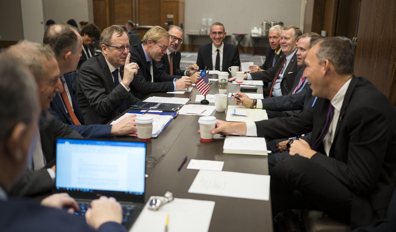 NASA Administrator Jim Bridenstine, third from right, and Deputy Administrator Jim Morhard, fourth from right, speak with Professor Johann-Dietrich Worner, Director General of ESA (European Space Agency), fourth from left, during the 70th International Astronautical Congress, Tuesday, Oct. 22, 2019 in Washington. Photo Credit: (NASA/Aubrey Gemignani)