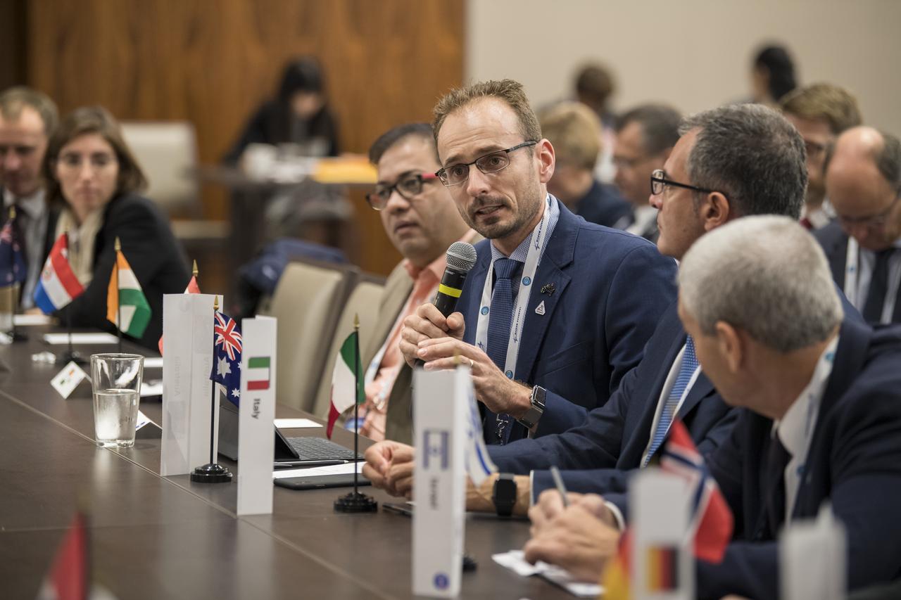 Austrailian Space Agency (ASA) Deputy Head, Anthony Murfett, speaks to NASA Administrator Jim Bridenstine during a multilateral meeting of the heads of space agencies at the 70th International Astronautical Congress, Tuesday, Oct. 22, 2019 in Washington. Photo Credit: (NASA/Aubrey Gemignani)