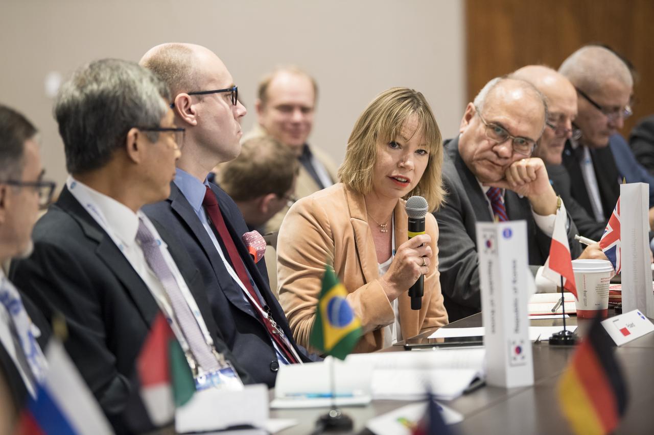 Swedish National Space Agency Director General, Anna Rathsman, speaks to NASA Administrator Jim Bridenstine during a multilateral meeting of the heads of space agencies at the 70th International Astronautical Congress, Tuesday, Oct. 22, 2019 in Washington. Photo Credit: (NASA/Aubrey Gemignani)