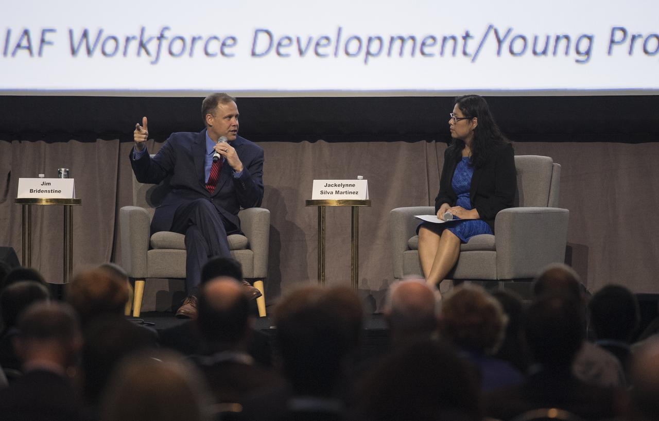 NASA Administrator Jim Bridenstine, left, and Jackelynne Silva-Martinez, an Aerospace Engineer in Mission Planning Operations at NASA’s Johnson Space Center are seen during the Global Networking Forum Young Professionals Town Hall at the 70th International Astronautical Congress, Wednesday, Oct. 23, 2019 at the Walter E. Washington Convention Center in Washington. Photo Credit: (NASA/Joel Kowsky)