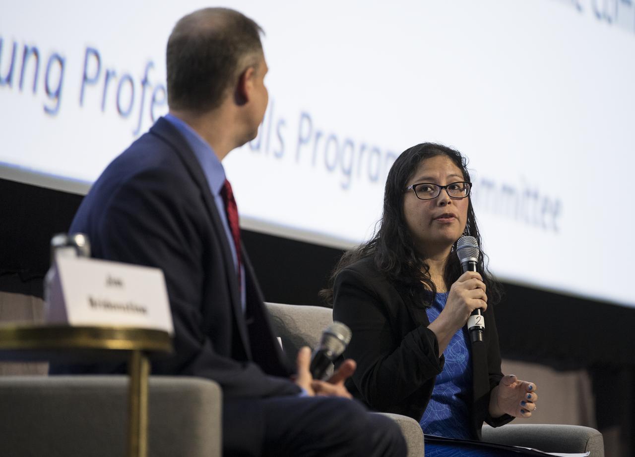 Jackelynne Silva-Martinez, an Aerospace Engineer in Mission Planning Operations at NASA’s Johnson Space Center, right, asks NASA Administrator Jim Bridenstine a question during the Global Networking Forum Young Professionals Town Hall at the 70th International Astronautical Congress, Wednesday, Oct. 23, 2019 at the Walter E. Washington Convention Center in Washington. Photo Credit: (NASA/Joel Kowsky)