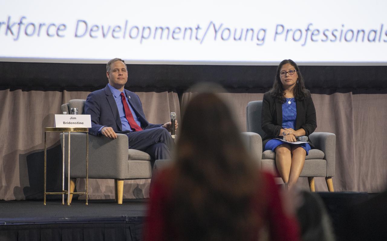 NASA Administrator Jim Bridenstine, left, and Jackelynne Silva-Martinez, an Aerospace Engineer in Mission Planning Operations at NASA’s Johnson Space Center listen to a question from a member of the audience during the Global Networking Forum Young Professionals Town Hall at the 70th International Astronautical Congress, Wednesday, Oct. 23, 2019 at the Walter E. Washington Convention Center in Washington. Photo Credit: (NASA/Joel Kowsky)