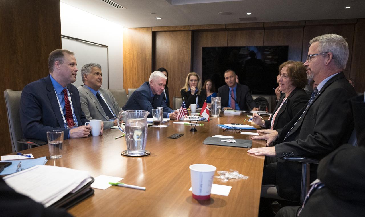 NASA Administrator Jim Bridenstine, right is seen during a meeting with Sylvain Laporte, President of the Canadian Space Agency, at the 70th International Astronautical Congress, Wednesday, Oct. 23, 2019 in Washington. Photo Credit: (NASA/Joel Kowsky)