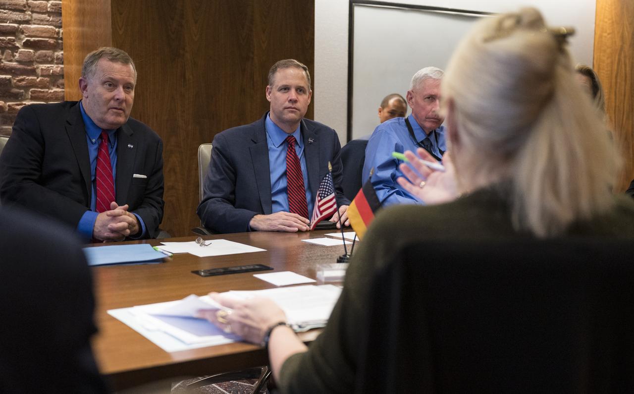 NASA Administrator Jim Bridenstine, right, and Deputy Administrator Jim Morhard, are seen during a meeting with Pascale Ehrenfreund, Chair of the Executive Board of the German Aerospace Center (DLR) and other members of the executive board at the 70th International Astronautical Congress, Wednesday, Oct. 23, 2019 in Washington. Photo Credit: (NASA/Joel Kowsky)
