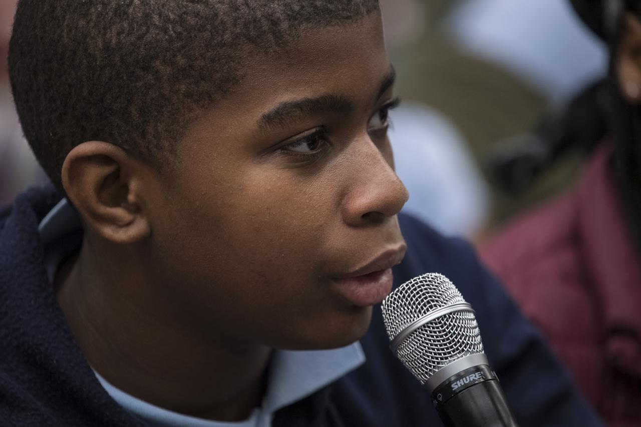 A student asks a panel of NASA astronauts including Doug Wheelock, Alvin Drew, Jeanette Epps, and former astronauts Janet Kavandi, and Bob Curbeam, a question about their time in space at a STEM day session during the 70th International Astronautical Congress, Wednesday, Oct. 23, 2019 at the Walter E. Washington Convention Center in Washington. Photo credit: (NASA/Aubrey Gemignani)