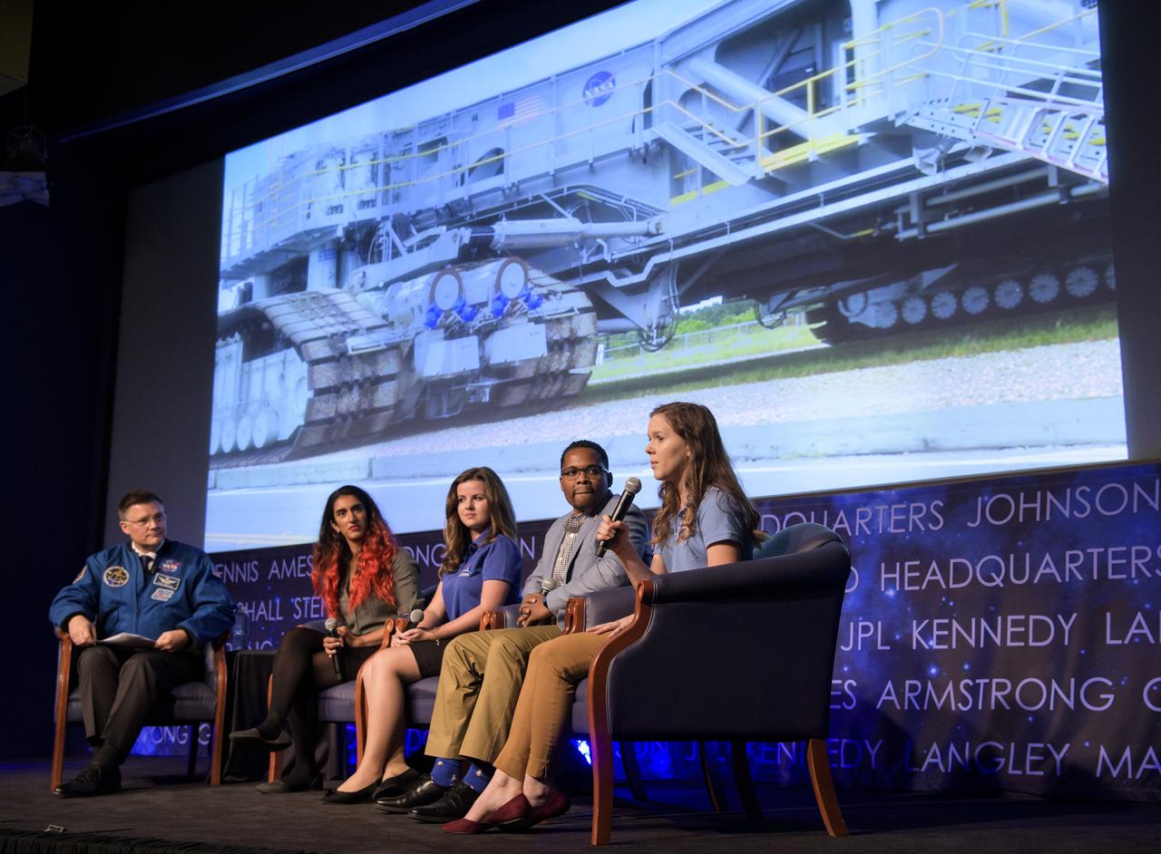 Breanne Stichler, a mechanical engineer in the Crawlers, Transporters and Structures group at NASA’s Kennedy Space Center, right, speaks about her path to working at NASA during an interactive STEM discussion with students attending the 70th International Astronautical Congress, Wednesday, Oct. 23, 2019, at NASA Headquarters in Washington. Photo Credit: (NASA/Joel Kowsky)