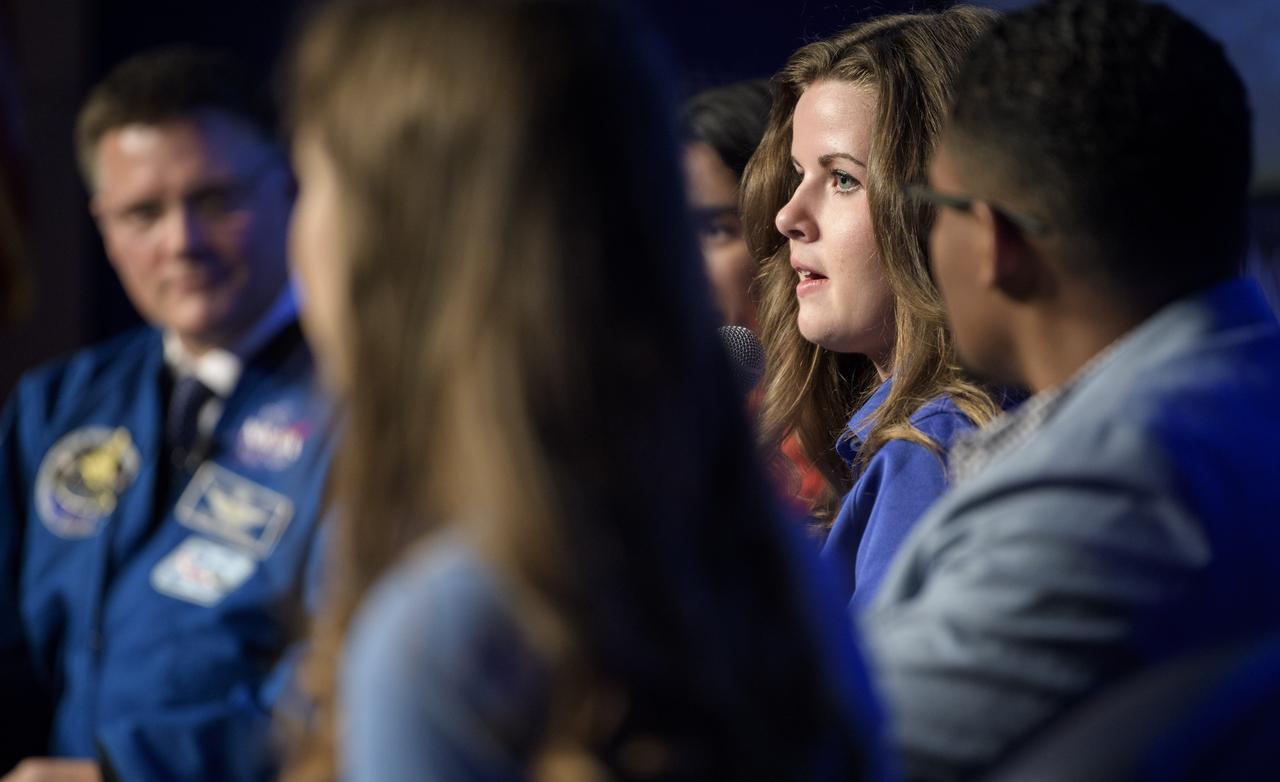 Alexis Vance, a Pathways student engineering trainee at NASA’s Johnson Space Center, speaks about being an intern at NASA’s Johnson Space Center during an interactive STEM discussion with students attending the 70th International Astronautical Congress, Wednesday, Oct. 23, 2019, at NASA Headquarters in Washington.  Photo Credit: (NASA/Joel Kowsky)