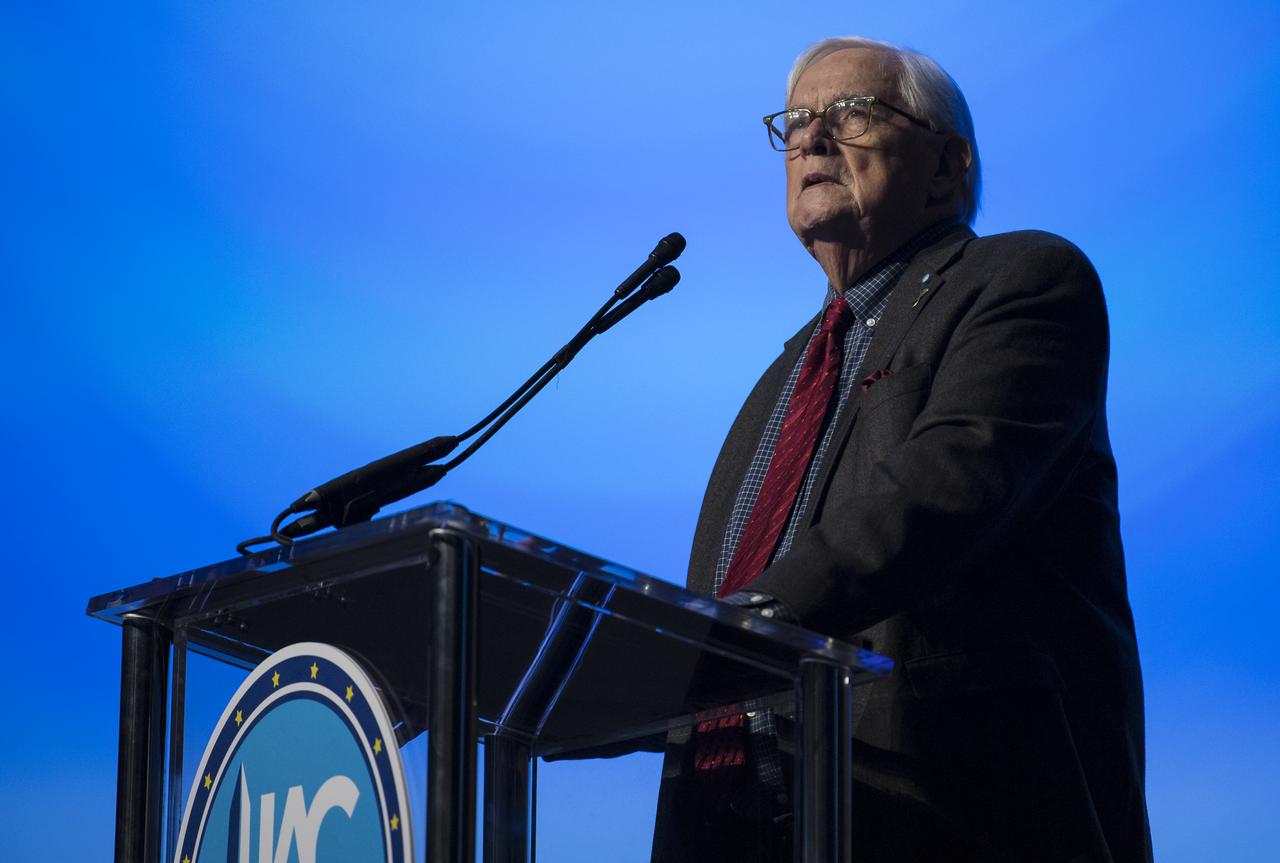 John Logsdon, Apollo historian and Professor Emeritus at George Washington University, speaks about the history of the Apollo program during the International Astronautical Federation World Space Award highlight lecture at the 70th International Astronautical Congress, Thursday, Oct. 24, 2019, at the Walter E. Washington Convention Center in Washington. The 2019 World Space Award was presented to the crew of Apollo 11. Photo Credit: (NASA/Joel Kowsky)