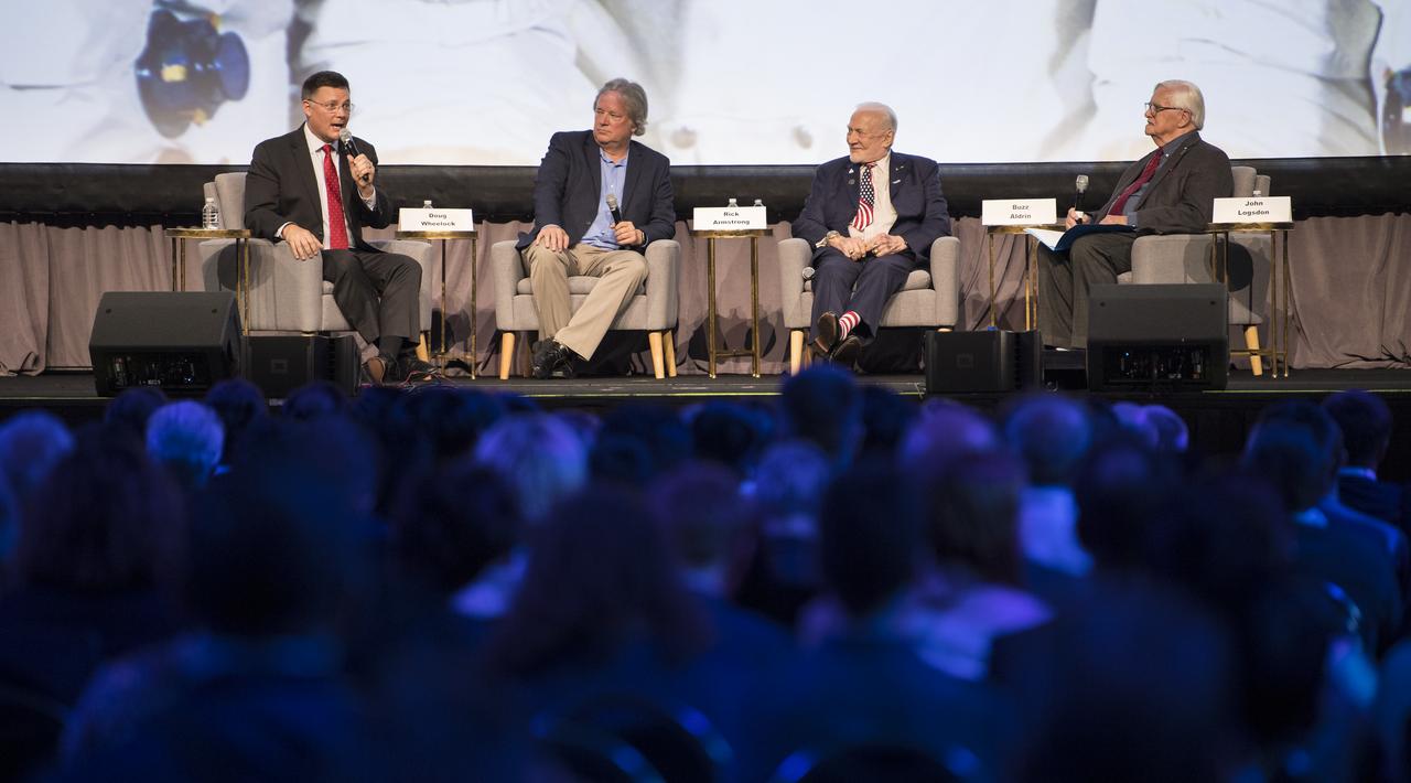 NASA astronaut Doug Wheelock, left, Rick Armstrong, son of Apollo 11 astronaut Neil Armstrong, second from left, Apollo 11 astronaut Buzz Aldrin, second from right, and John Logsdon, Apollo historian and Professor Emeritus at George Washington University, right, are seen during a panel discussion during the International Astronautical Federation World Space Award highlight lecture at the 70th International Astronautical Congress, Thursday, Oct. 24, 2019, at the Walter E. Washington Convention Center in Washington. The 2019 World Space Award was presented to the crew of Apollo 11. Photo Credit: (NASA/Joel Kowsky)