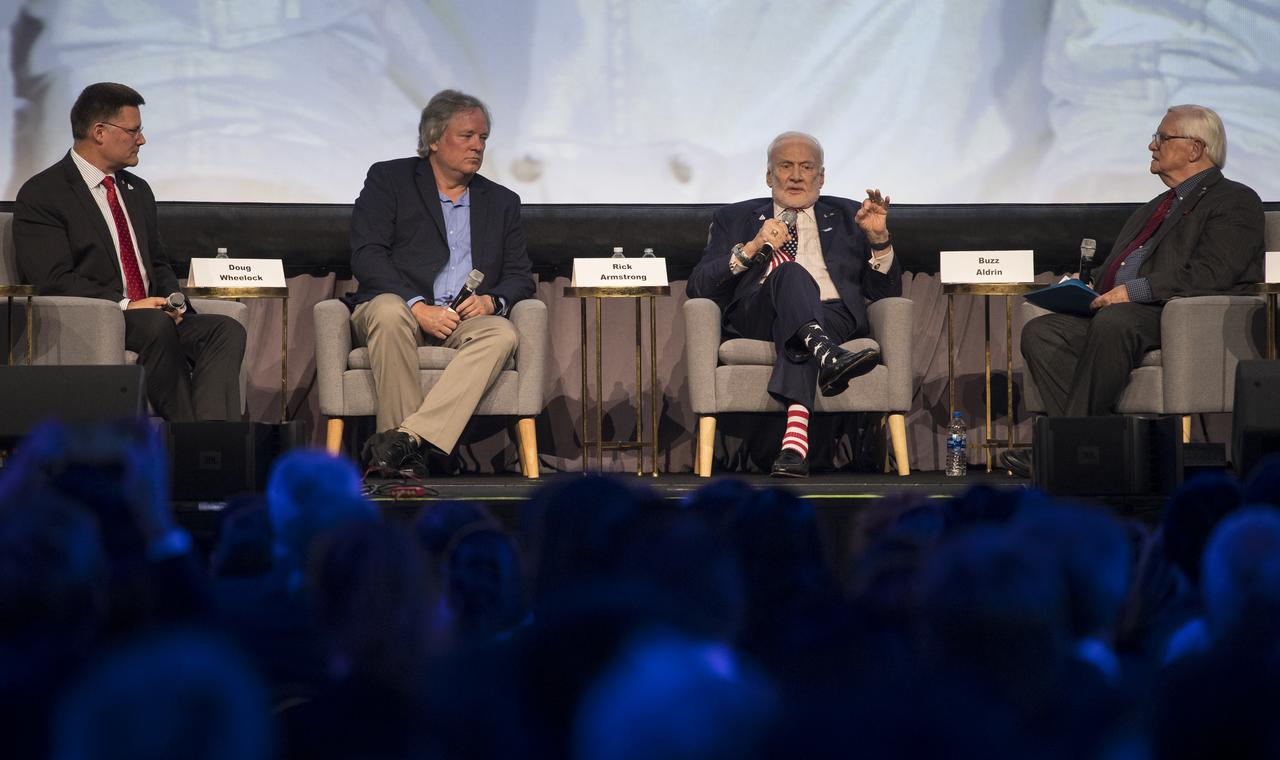 NASA astronaut Doug Wheelock, left, Rick Armstrong, son of Apollo 11 astronaut Neil Armstrong, second from left, Apollo 11 astronaut Buzz Aldrin, second from right, and John Logsdon, Apollo historian and Professor Emeritus at George Washington University, right, are seen during a panel discussion during the International Astronautical Federation World Space Award highlight lecture at the 70th International Astronautical Congress, Thursday, Oct. 24, 2019, at the Walter E. Washington Convention Center in Washington. The 2019 World Space Award was presented to the crew of Apollo 11. Photo Credit: (NASA/Joel Kowsky)