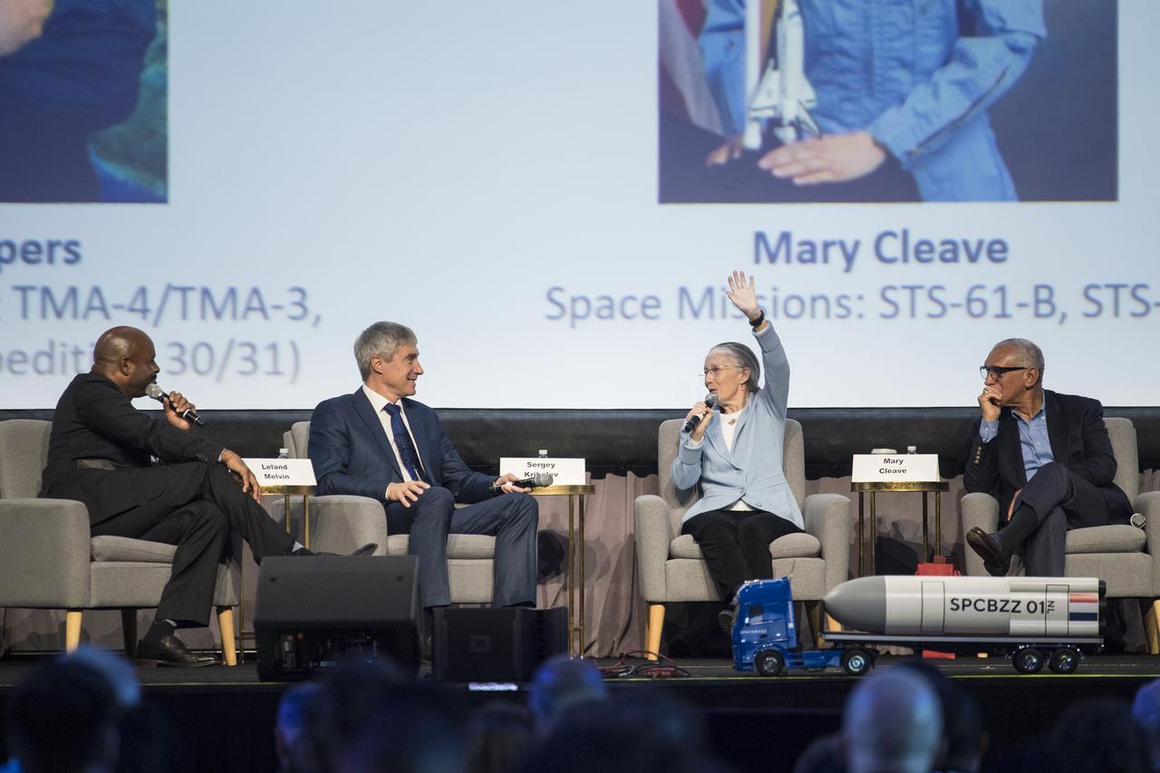 Former NASA astronaut Leland Melvin, left, moderates a panel with, from left to right, Roscosmos cosmonaut and executive director for piloted spaceflights, Sergey Krikalev; former NASA astronaut Mary Cleave, former NASA Administrator and astronaut, Charlie Bolden; ESA (European Space Agency) astronaut, André Kuipers (not pictured); and European astronaut and professor, Institute of Space Systems, Reinhold Ewald, during the 70th International Astronautical Congress, Friday, Oct. 25, 2019, at the Walter E. Washington Convention Center in Washington. Photo credit: (NASA/Aubrey Gemignani)