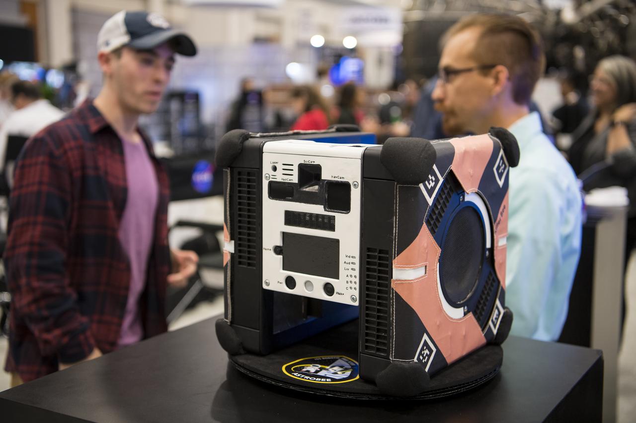 A model of the Astrobee robot is seen at the NASA exhibit during the 70th International Astronautical Congress, Friday, Oct. 25, 2019, at the Walter E. Washington Convention Center in Washington. Photo credit: (NASA/Aubrey Gemignani)