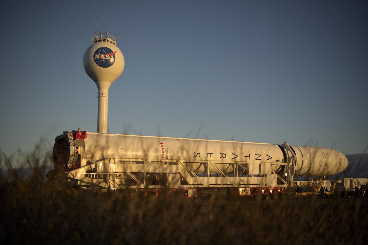 A Northrop Grumman Antares rocket is seen as it rolls out to Pad-0A, Tuesday, Oct. 29, 2019, at NASA's Wallops Flight Facility in Virginia. Northrop Grumman’s 12th contracted cargo resupply mission with NASA to the International Space Station will deliver about 8,200 pounds of science and research, crew supplies and vehicle hardware to the orbital laboratory and its crew. Launch is scheduled for 9:59 a.m. EDT Saturday, Nov. 2.  Photo Credit: (NASA/Bill Ingalls)