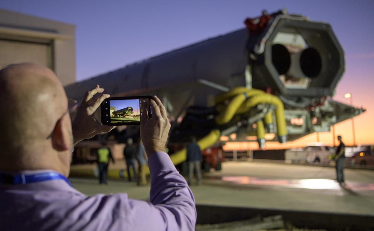 A Northrop Grumman Antares rocket is seen as it is rolled out of the Horizontal Integration Facility to launch Pad-0A, Tuesday, Oct. 29, 2019, at NASA's Wallops Flight Facility in Virginia. Northrop Grumman’s 12th contracted cargo resupply mission with NASA to the International Space Station will deliver about 8,200 pounds of science and research, crew supplies and vehicle hardware to the orbital laboratory and its crew. Launch is scheduled for 9:59 a.m. EDT Saturday, Nov. 2.  Photo Credit: (NASA/Bill Ingalls)
