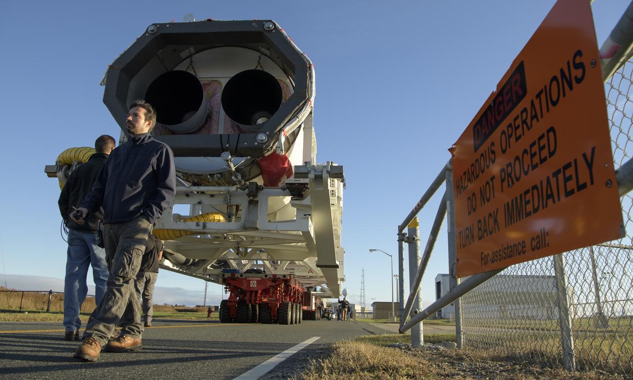 A Northrop Grumman Antares rocket is seen as it rolls out to Pad-0A, Tuesday, Oct. 29, 2019, at NASA's Wallops Flight Facility in Virginia. Northrop Grumman’s 12th contracted cargo resupply mission with NASA to the International Space Station will deliver about 8,200 pounds of science and research, crew supplies and vehicle hardware to the orbital laboratory and its crew. Launch is scheduled for 9:59 a.m. EDT Saturday, Nov. 2.  Photo Credit: (NASA/Bill Ingalls)