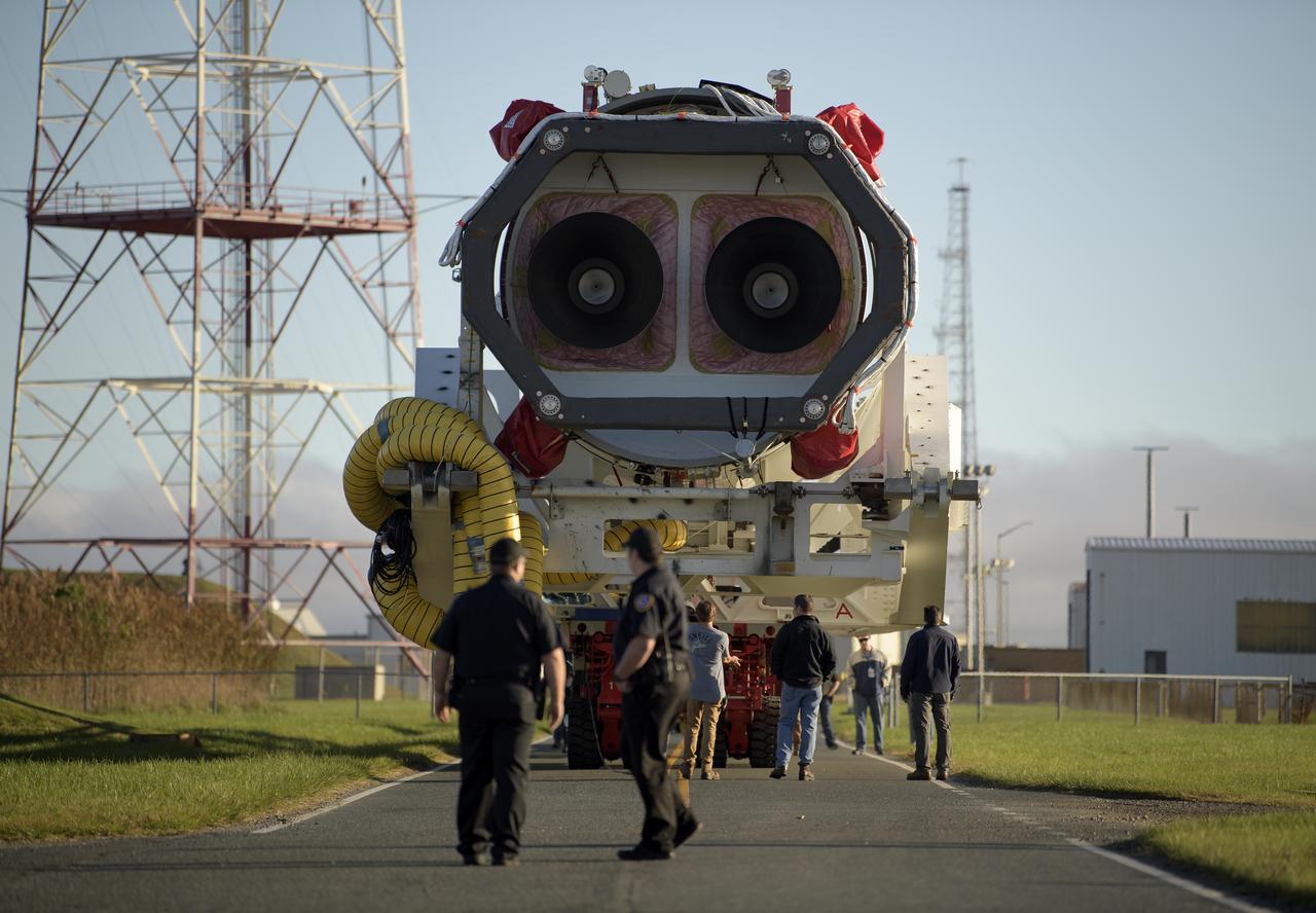 A Northrop Grumman Antares rocket is seen as it rolls out to Pad-0A, Tuesday, Oct. 29, 2019, at NASA's Wallops Flight Facility in Virginia. Northrop Grumman’s 12th contracted cargo resupply mission with NASA to the International Space Station will deliver about 8,200 pounds of science and research, crew supplies and vehicle hardware to the orbital laboratory and its crew. Launch is scheduled for 9:59 a.m. EDT Saturday, Nov. 2.  Photo Credit: (NASA/Bill Ingalls)