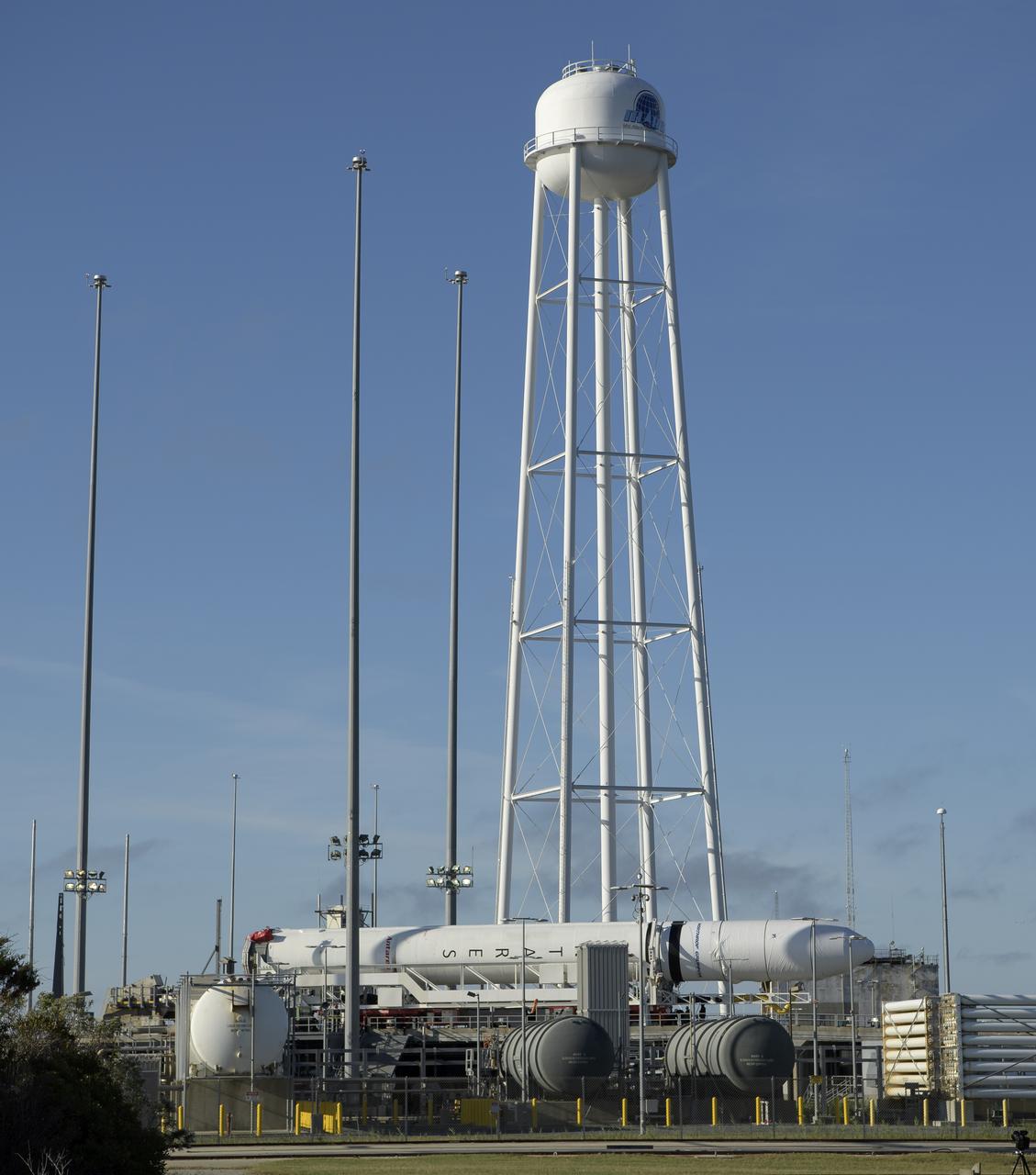 A Northrop Grumman Antares rocket arrives at launch Pad-0A, Tuesday, Oct. 29, 2019, at NASA's Wallops Flight Facility in Virginia. Northrop Grumman’s 12th contracted cargo resupply mission with NASA to the International Space Station will deliver about 8,200 pounds of science and research, crew supplies and vehicle hardware to the orbital laboratory and its crew. Launch is scheduled for 9:59 a.m. EDT Saturday, Nov. 2.  Photo Credit: (NASA/Bill Ingalls)