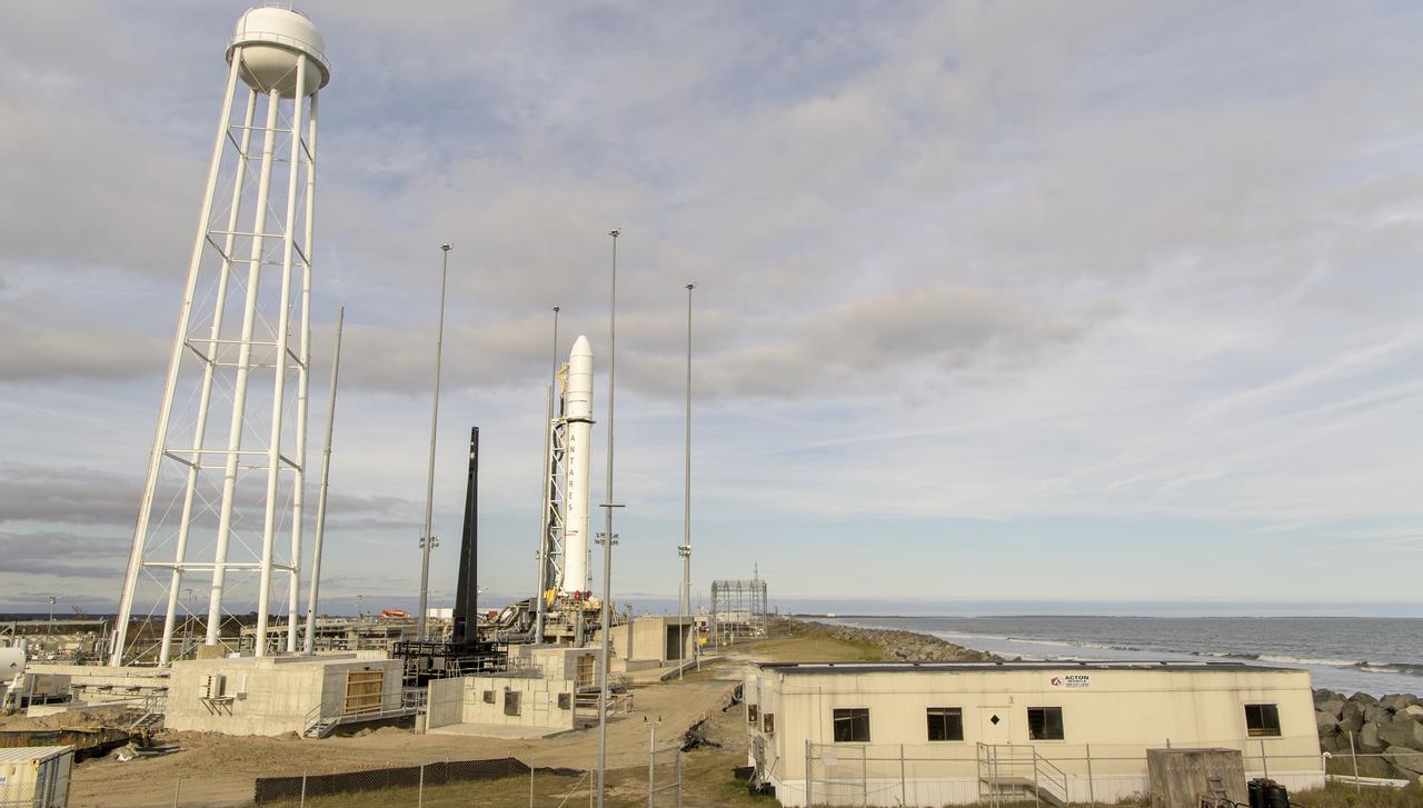 The Northrop Grumman Antares rocket is seen a few hours after arriving at launch Pad-0A, Tuesday, Oct. 29, 2019, at NASA's Wallops Flight Facility in Virginia. Northrop Grumman’s 12th contracted cargo resupply mission with NASA to the International Space Station will deliver about 8,200 pounds of science and research, crew supplies and vehicle hardware to the orbital laboratory and its crew. Launch is scheduled for 9:59 a.m. EDT Saturday, Nov. 2.  Photo Credit: (NASA/Bill Ingalls)