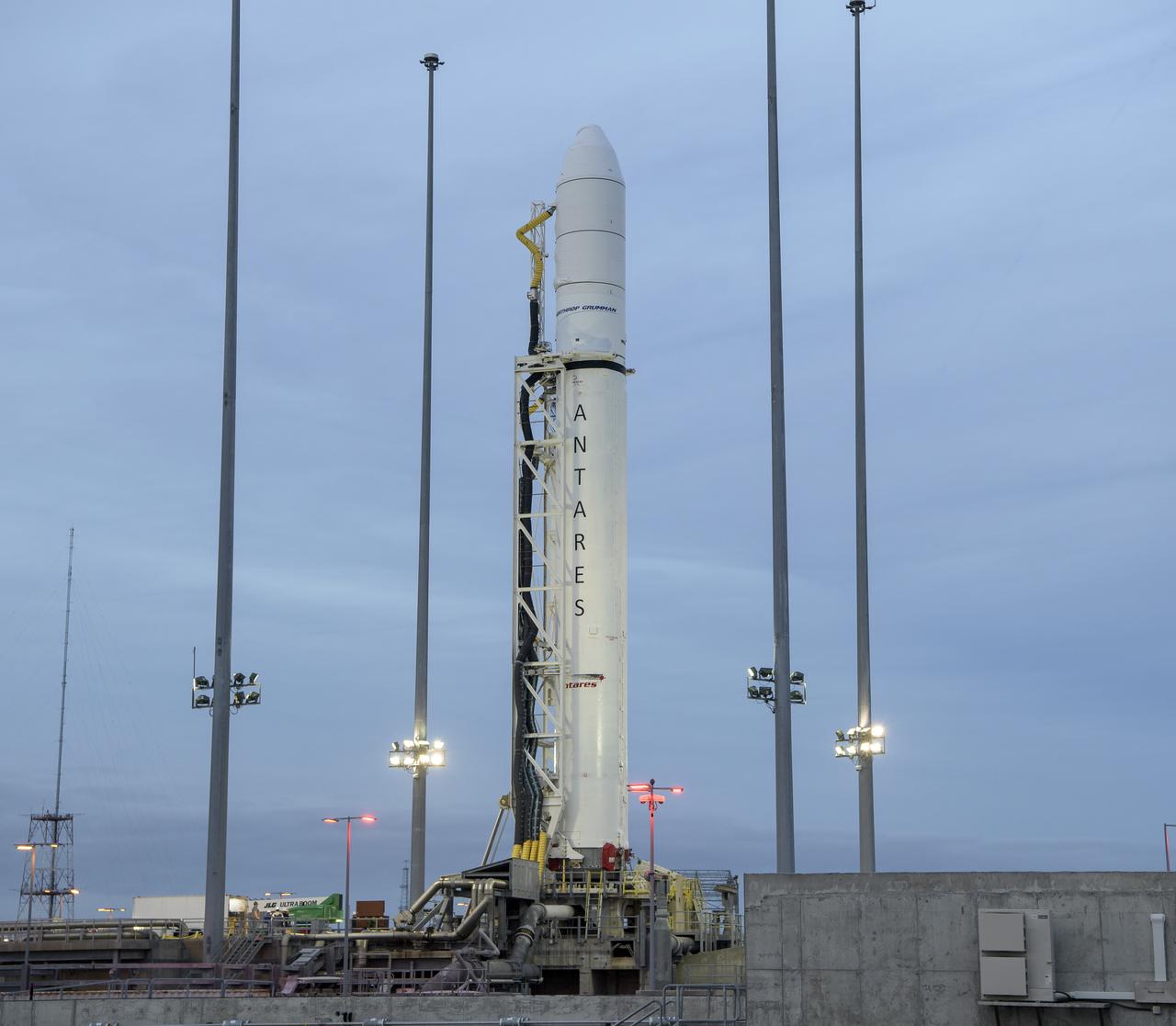 The Northrop Grumman Antares rocket is seen a few hours after arriving at launch Pad-0A, Tuesday, Oct. 29, 2019, at NASA's Wallops Flight Facility in Virginia. Northrop Grumman’s 12th contracted cargo resupply mission with NASA to the International Space Station will deliver about 8,200 pounds of science and research, crew supplies and vehicle hardware to the orbital laboratory and its crew. Launch is scheduled for 9:59 a.m. EDT Saturday, Nov. 2.  Photo Credit: (NASA/Bill Ingalls)