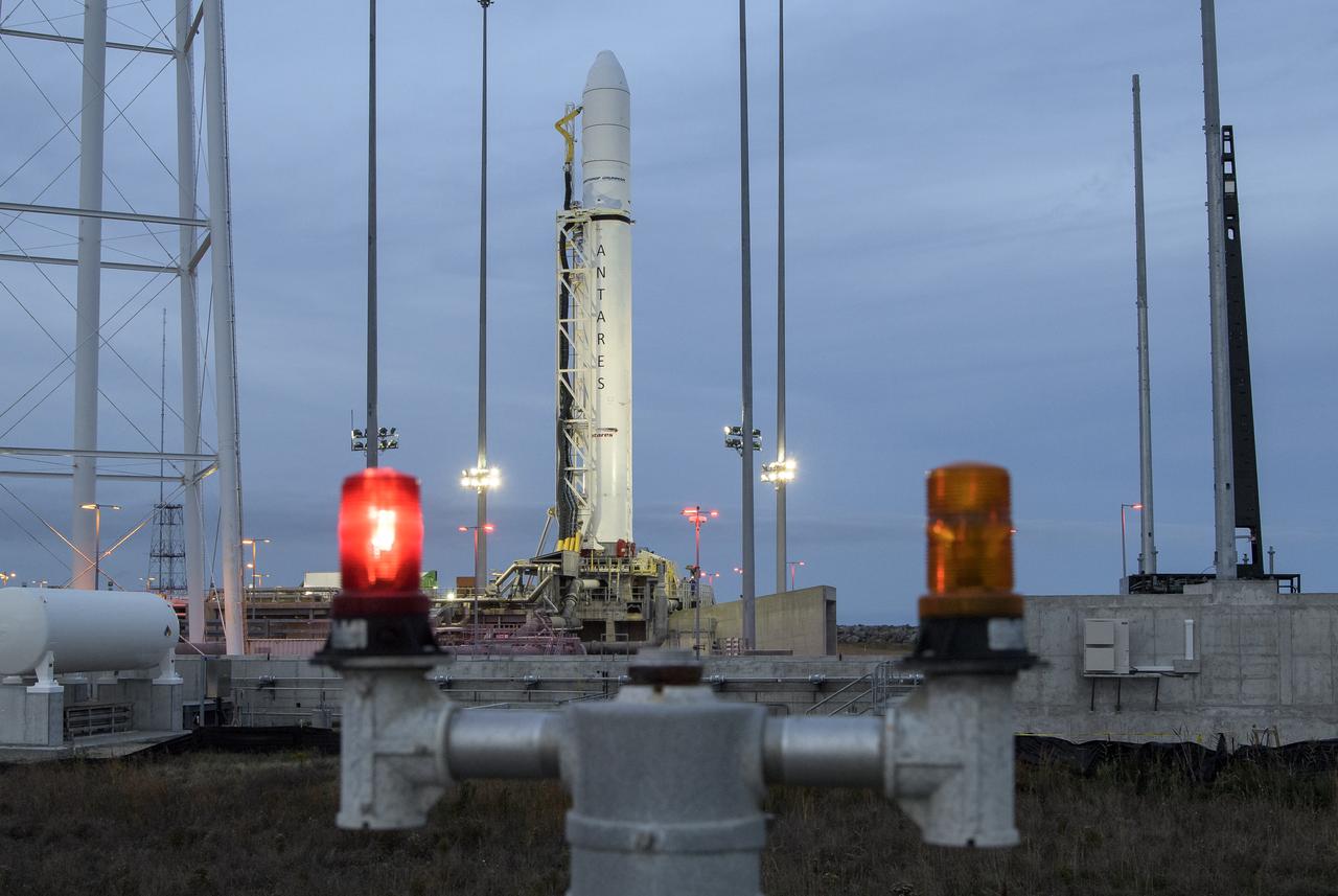 The Northrop Grumman Antares rocket is seen a few hours after arriving at launch Pad-0A, Tuesday, Oct. 29, 2019, at NASA's Wallops Flight Facility in Virginia. Northrop Grumman’s 12th contracted cargo resupply mission with NASA to the International Space Station will deliver about 8,200 pounds of science and research, crew supplies and vehicle hardware to the orbital laboratory and its crew. Launch is scheduled for 9:59 a.m. EDT Saturday, Nov. 2.  Photo Credit: (NASA/Bill Ingalls)