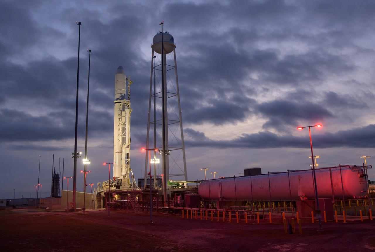 The Northrop Grumman Antares rocket is seen a few hours after arriving at launch Pad-0A, Tuesday, Oct. 29, 2019, at NASA's Wallops Flight Facility in Virginia. Northrop Grumman’s 12th contracted cargo resupply mission with NASA to the International Space Station will deliver about 8,200 pounds of science and research, crew supplies and vehicle hardware to the orbital laboratory and its crew. Launch is scheduled for 9:59 a.m. EDT Saturday, Nov. 2.  Photo Credit: (NASA/Bill Ingalls)