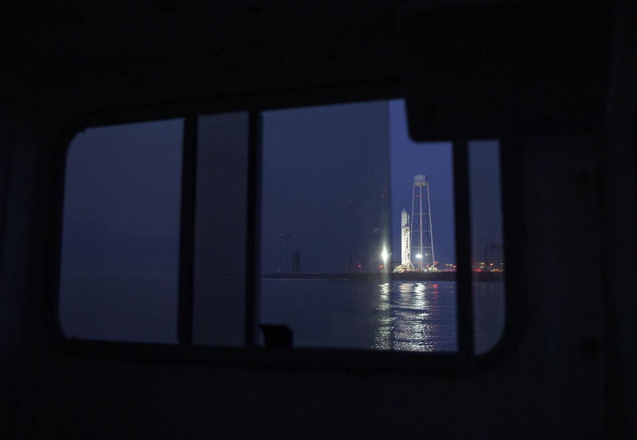 The Northrop Grumman Antares rocket is seen in the early morning on launch Pad-0A, Wednesday, Oct. 30, 2019, at NASA's Wallops Flight Facility in Virginia. Northrop Grumman’s 12th contracted cargo resupply mission with NASA to the International Space Station will deliver about 8,200 pounds of science and research, crew supplies and vehicle hardware to the orbital laboratory and its crew. Launch is scheduled for 9:59 a.m. EDT Saturday, Nov. 2.  Photo Credit: (NASA/Bill Ingalls)