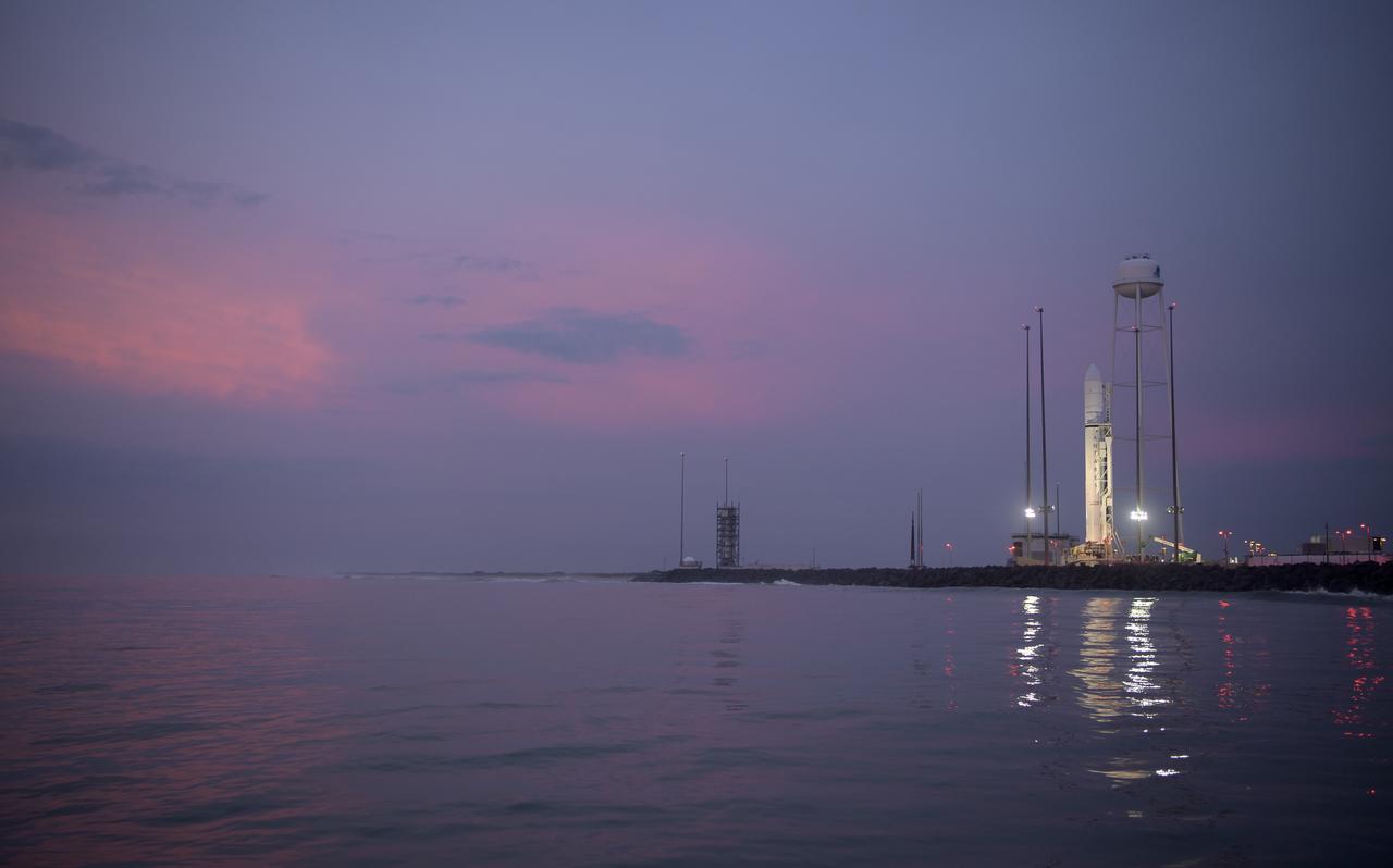 The Northrop Grumman Antares rocket is seen in the early morning on launch Pad-0A, Wednesday, Oct. 30, 2019, at NASA's Wallops Flight Facility in Virginia. Northrop Grumman’s 12th contracted cargo resupply mission with NASA to the International Space Station will deliver about 8,200 pounds of science and research, crew supplies and vehicle hardware to the orbital laboratory and its crew. Launch is scheduled for 9:59 a.m. EDT Saturday, Nov. 2.  Photo Credit: (NASA/Bill Ingalls)