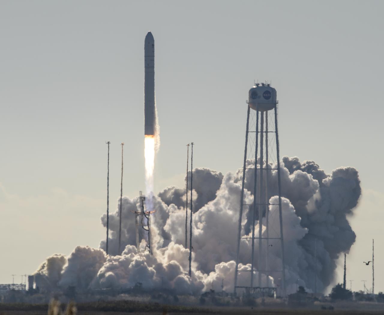 The Northrop Grumman Antares rocket, with Cygnus resupply spacecraft onboard, launches from Pad-0A of NASA's Wallops Flight Facility, Saturday, November 2, 2019, in Virginia.  Northrop Grumman’s 12th contracted cargo resupply mission with NASA to the International Space Station will deliver about 8,200 pounds of science and research, crew supplies and vehicle hardware to the orbital laboratory and its crew. Photo Credit: (NASA/Bill Ingalls)