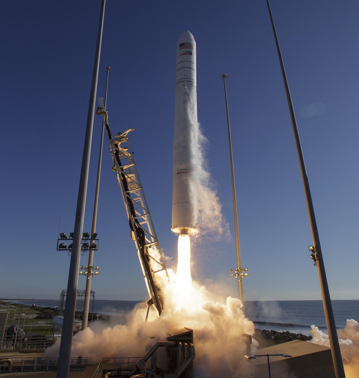 The Northrop Grumman Antares rocket, with Cygnus resupply spacecraft onboard, launches from Pad-0A of NASA's Wallops Flight Facility, Saturday, November 2, 2019, in Virginia.  Northrop Grumman’s 12th contracted cargo resupply mission with NASA to the International Space Station will deliver about 8,200 pounds of science and research, crew supplies and vehicle hardware to the orbital laboratory and its crew. Photo Credit: (NASA/Bill Ingalls)