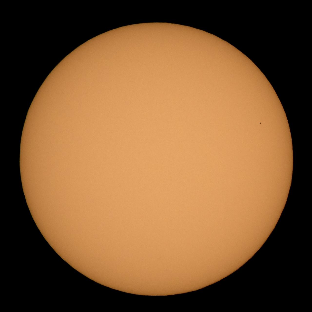 The planet Mercury is seen in silhouette as it nearly completes transiting across the face of the Sun, Monday, Nov. 11, 2019, in Arlington, Virginia. Mercury’s last transit was in 2016.  the next won't happen again until 2032. Photo Credit: (NASA/Bill Ingalls)