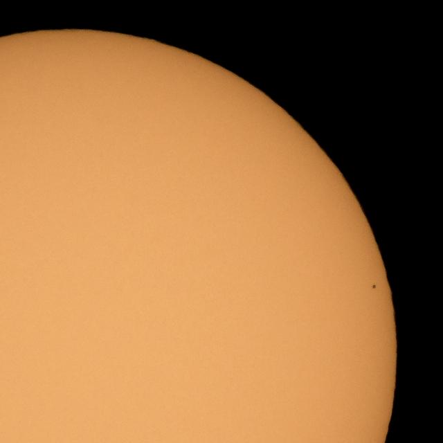 The planet Mercury is seen in silhouette as it nearly completes transiting across the face of the Sun, Monday, Nov. 11, 2019, in Arlington, Virginia. Mercury’s last transit was in 2016.  the next won't happen again until 2032. Photo Credit: (NASA/Bill Ingalls)