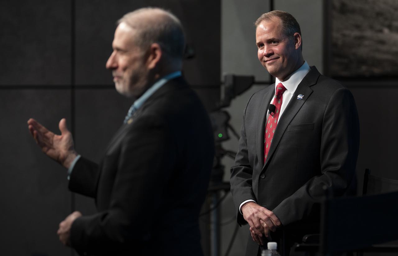 NASA Administrator Jim Bridenstine, right, looks on as NASA Associate Administrator for the Human Exploration and Operations Mission Directorate Douglas Loverro answers a question during a NASA town hall event, Tuesday, Dec. 3, 2019, at NASA Headquarters in Washington. Photo Credit: (NASA/Joel Kowsky)