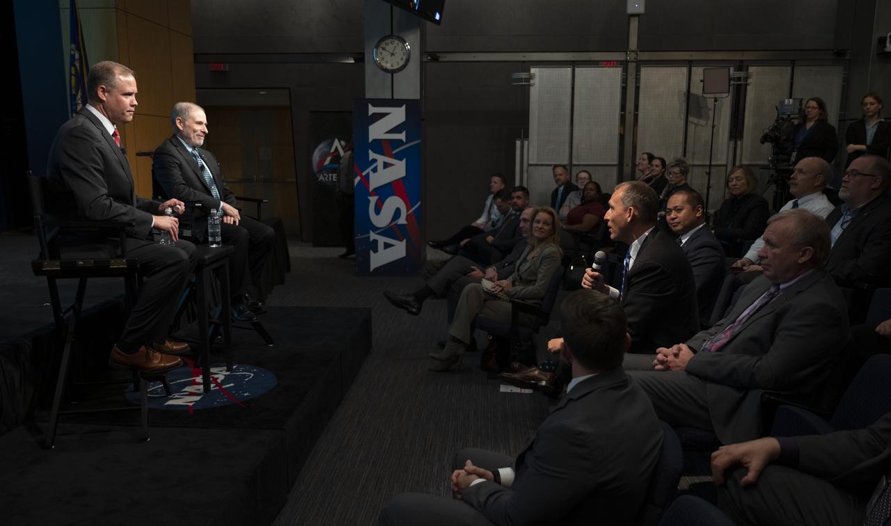 NASA Associate Administrator for the Science Mission Directorate Thomas Zurbuchen, right, asks a question during a NASA town hall event with NASA Administrator Jim Bridenstine and NASA Associate Administrator for the Human Exploration and Operations Mission Directorate Douglas Loverro, Tuesday, Dec. 3, 2019, at NASA Headquarters in Washington. Photo Credit: (NASA/Joel Kowsky)