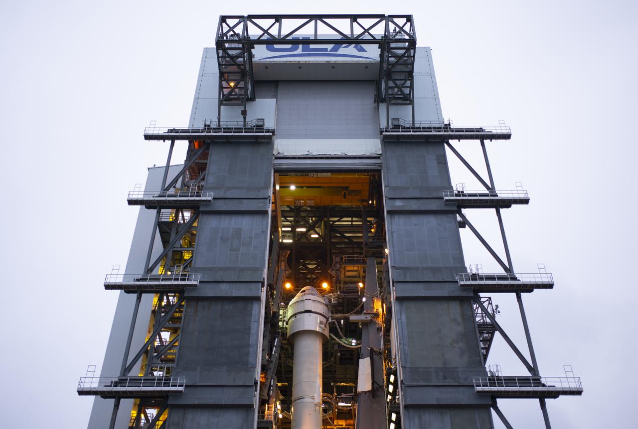 A United Launch Alliance Atlas V rocket with Boeing’s CST-100 Starliner spacecraft onboard is seen inside the Vertical Integration Facility before being rolled out to the launch pad at Space Launch Complex 41 ahead of the Orbital Flight Test mission, Wednesday, Dec. 18, 2019 at Cape Canaveral Air Force Station in Florida. The uncrewed Orbital Flight Test will be Starliner’s maiden mission to the International Space Station for NASA's Commercial Crew Program. The mission, currently targeted for a 6:26 a.m. EST launch on Dec. 20, will serve as an end-to-end test of the system's capabilities. Photo Credit: (NASA/Joel Kowsky)