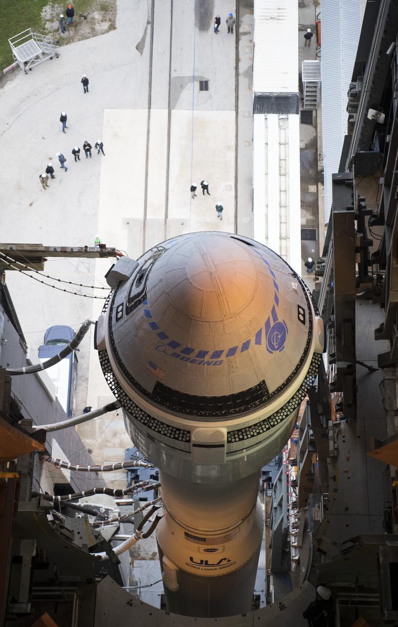A United Launch Alliance Atlas V rocket with Boeing’s CST-100 Starliner spacecraft onboard is seen inside the Vertical Integration Facility before being rolled out to the launch pad at Space Launch Complex 41 ahead of the Orbital Flight Test mission, Wednesday, Dec. 18, 2019 at Cape Canaveral Air Force Station in Florida. The uncrewed Orbital Flight Test will be Starliner’s maiden mission to the International Space Station for NASA's Commercial Crew Program. The mission, currently targeted for a 6:26 a.m. EST launch on Dec. 20, will serve as an end-to-end test of the system's capabilities. Photo Credit: (NASA/Joel Kowsky)
