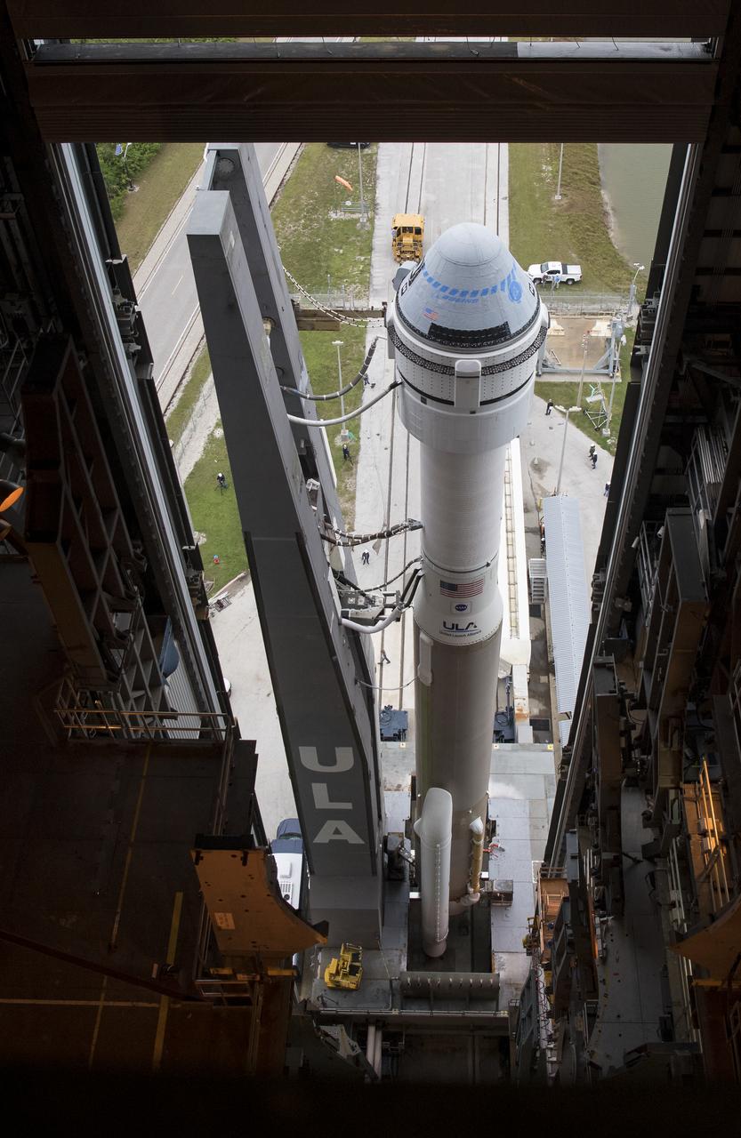 A United Launch Alliance Atlas V rocket with Boeing’s CST-100 Starliner spacecraft onboard is seen as it is rollout out of the Vertical Integration Facility to the launch pad at Space Launch Complex 41 ahead of the Orbital Flight Test mission, Wednesday, Dec. 18, 2019 at Cape Canaveral Air Force Station in Florida. The uncrewed Orbital Flight Test will be Starliner’s maiden mission to the International Space Station for NASA's Commercial Crew Program. The mission, currently targeted for a 6:26 a.m. EST launch on Dec. 20, will serve as an end-to-end test of the system's capabilities. Photo Credit: (NASA/Joel Kowsky)