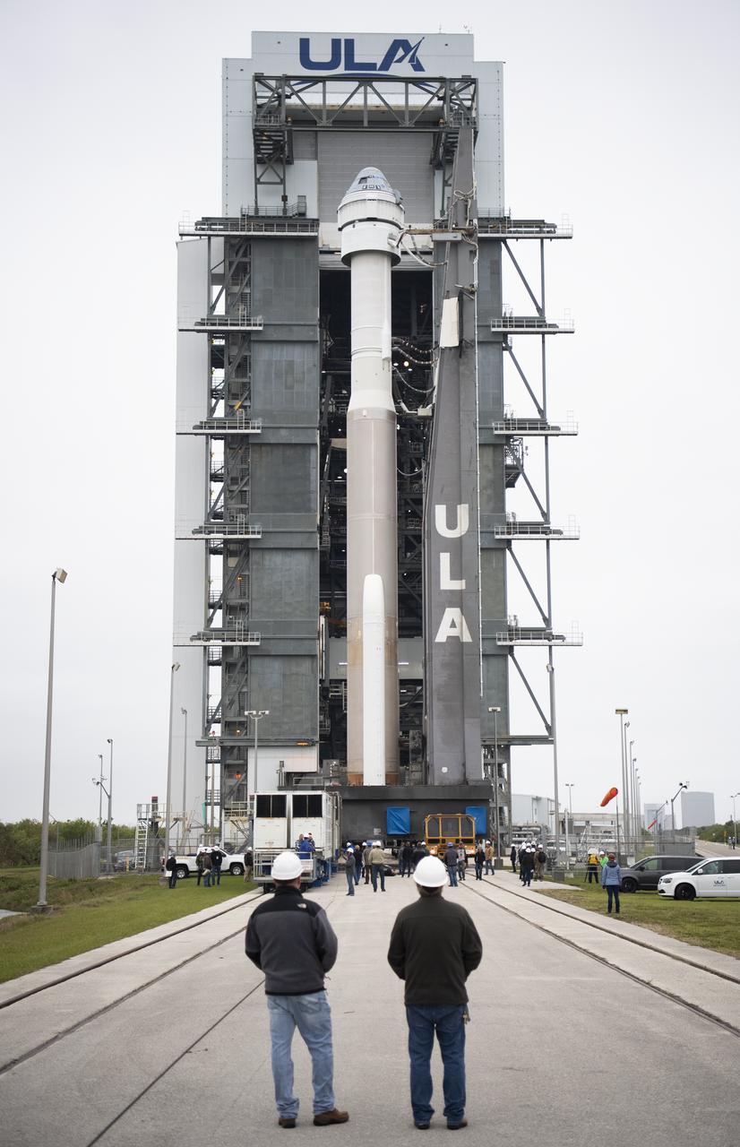 A United Launch Alliance Atlas V rocket with Boeing’s CST-100 Starliner spacecraft onboard is seen as it is rollout out of the Vertical Integration Facility to the launch pad at Space Launch Complex 41 ahead of the Orbital Flight Test mission, Wednesday, Dec. 18, 2019 at Cape Canaveral Air Force Station in Florida. The uncrewed Orbital Flight Test will be Starliner’s maiden mission to the International Space Station for NASA's Commercial Crew Program. The mission, currently targeted for a 6:26 a.m. EST launch on Dec. 20, will serve as an end-to-end test of the system's capabilities. Photo Credit: (NASA/Joel Kowsky)