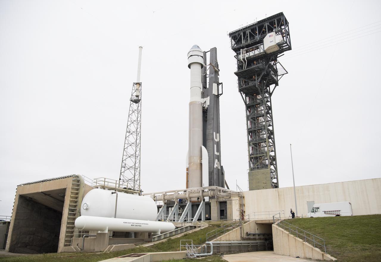 A United Launch Alliance Atlas V rocket with Boeing’s CST-100 Starliner spacecraft onboard is seen on the launch pad at Space Launch Complex 41 ahead of the Orbital Flight Test mission, Wednesday, Dec. 18, 2019 at Cape Canaveral Air Force Station in Florida. The uncrewed Orbital Flight Test will be Starliner’s maiden mission to the International Space Station for NASA's Commercial Crew Program. The mission, currently targeted for a 6:26 a.m. EST launch on Dec. 20, will serve as an end-to-end test of the system's capabilities. Photo Credit: (NASA/Joel Kowsky)