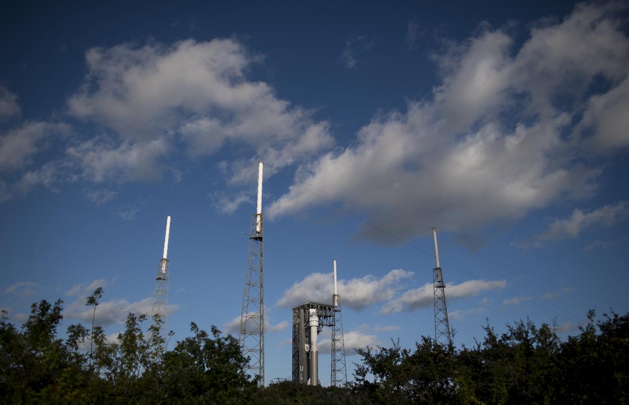 A United Launch Alliance Atlas V rocket with Boeing’s CST-100 Starliner spacecraft onboard is seen on the launch pad at Space Launch Complex 41 ahead of the Orbital Flight Test mission, Thursday, Dec. 19, 2019, at Cape Canaveral Air Force Station in Florida. The uncrewed Orbital Flight Test will be Starliner’s maiden mission to the International Space Station for NASA's Commercial Crew Program. The mission, currently targeted for a 6:26 a.m. EST launch on Dec. 20, will serve as an end-to-end test of the system's capabilities. Photo Credit: (NASA/Joel Kowsky)