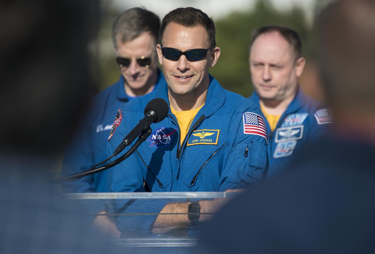NASA astronaut Josh Cassada answers a question during a press conference ahead of the Boeing Orbital Flight Test mission, Thursday, Dec. 19, 2019, at NASA’s Kennedy Space Center in Florida. Cassada and NASA astronaut Suni Williams are assigned to the first operational flight of Boeing’s Starliner. The uncrewed Orbital Flight Test will be Starliner’s maiden mission to the International Space Station for NASA's Commercial Crew Program. The mission, currently targeted for a 6:36 a.m. EST launch on Dec. 20, will serve as an end-to-end test of the system's capabilities. Photo Credit: (NASA/Joel Kowsky)