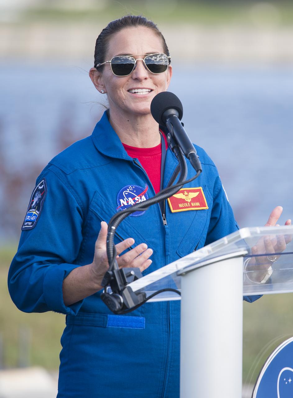 NASA astronaut Nicole Mann answers a question during a press conference ahead of the Boeing Orbital Flight Test mission, Thursday, Dec. 19, 2019, at Cape NASA’s Kennedy Space Center in Florida. Mann, NASA astronaut Michale Fincke, and Boeing astronaut Chris Ferguson are assigned to fly Boeing’s Crew Flight TestThe uncrewed Orbital Flight Test will be Starliner’s maiden mission to the International Space Station for NASA's Commercial Crew Program. The mission, currently targeted for a 6:36 a.m. EST launch on Dec. 20, will serve as an end-to-end test of the system's capabilities. Photo Credit: (NASA/Joel Kowsky)