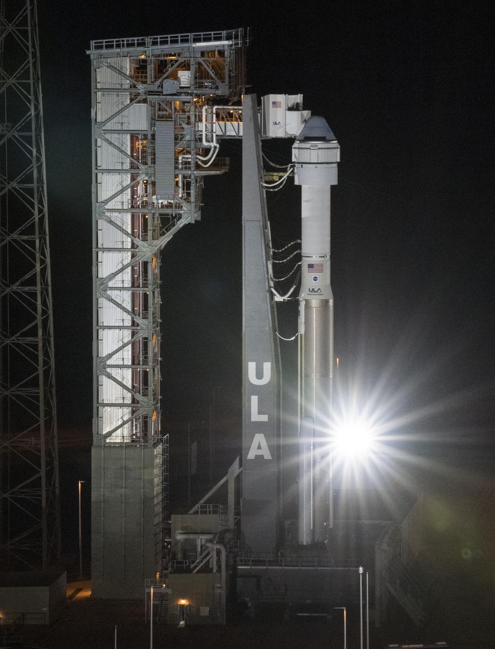 A United Launch Alliance Atlas V rocket with Boeing’s CST-100 Starliner spacecraft onboard is seen on the launch pad at Space Launch Complex 41 ahead of the Orbital Flight Test mission, Thursday, Dec. 19, 2019, at Cape Canaveral Air Force Station in Florida. The uncrewed Orbital Flight Test will be Starliner’s maiden mission to the International Space Station for NASA's Commercial Crew Program. The mission, currently targeted for a 6:36 a.m. EST launch on Dec. 20, will serve as an end-to-end test of the system's capabilities. Photo Credit: (NASA/Joel Kowsky)